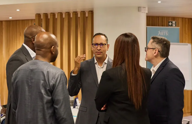 Guests in discussion during a break