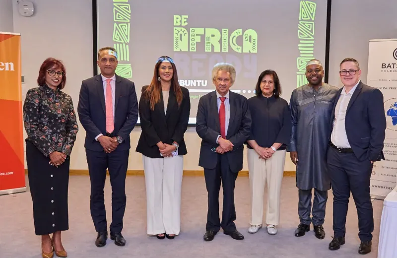 Speakers and hosts in front of the Be Africa Ready Ubuntu backdrop
